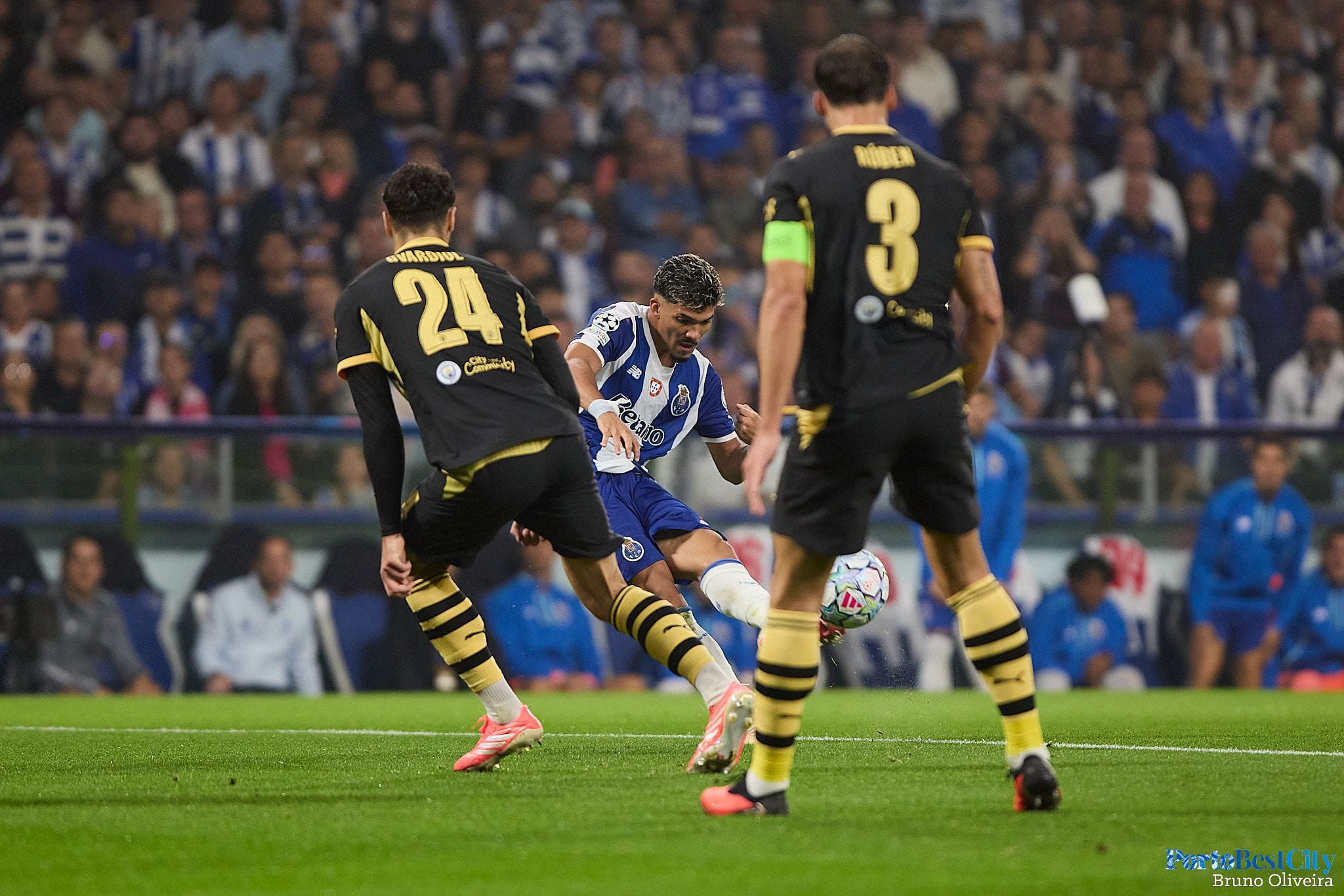 William Gomes tries to break through Manchester City’s defensive wall
